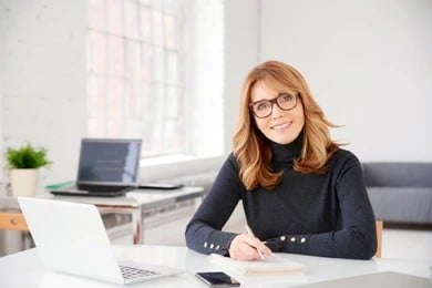 A dermatology account manager sitting at a desk