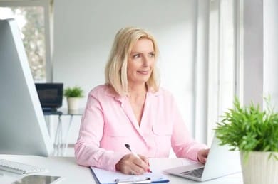 A dermatologist filling out provider credentialing paperwork